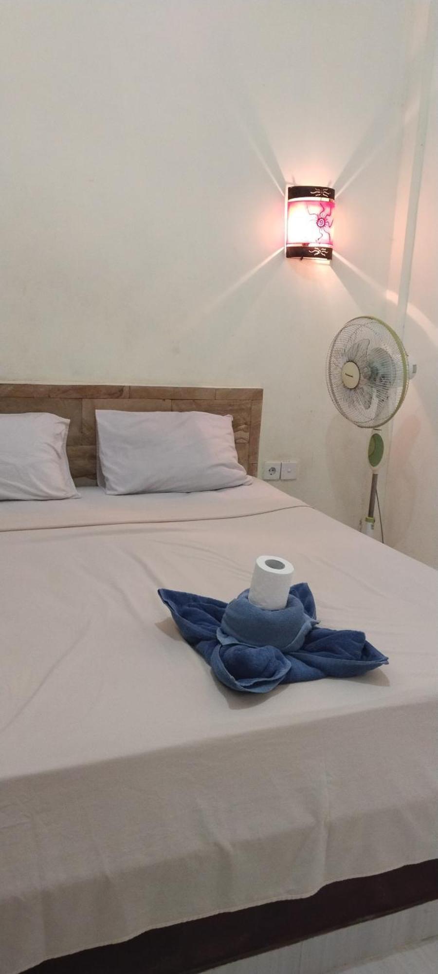 Amed Stop Inn Homestay, Rooftop Restaurant And Bar מראה חיצוני תמונה