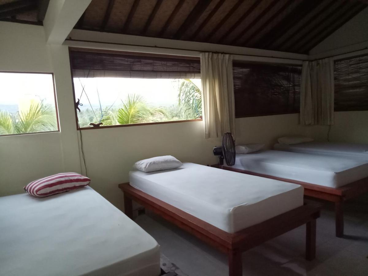 Amed Stop Inn Homestay, Rooftop Restaurant And Bar מראה חיצוני תמונה