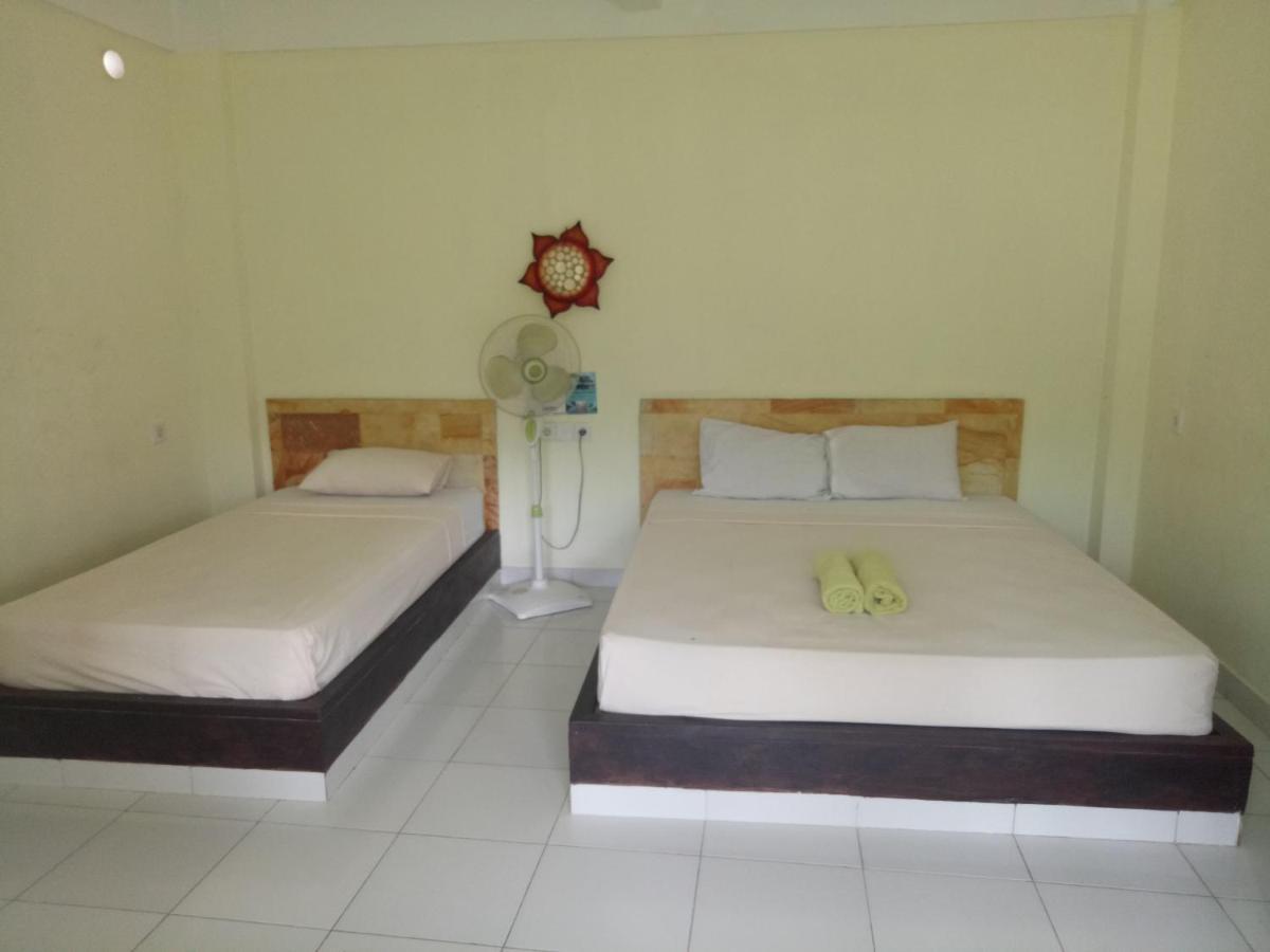 Amed Stop Inn Homestay, Rooftop Restaurant And Bar מראה חיצוני תמונה